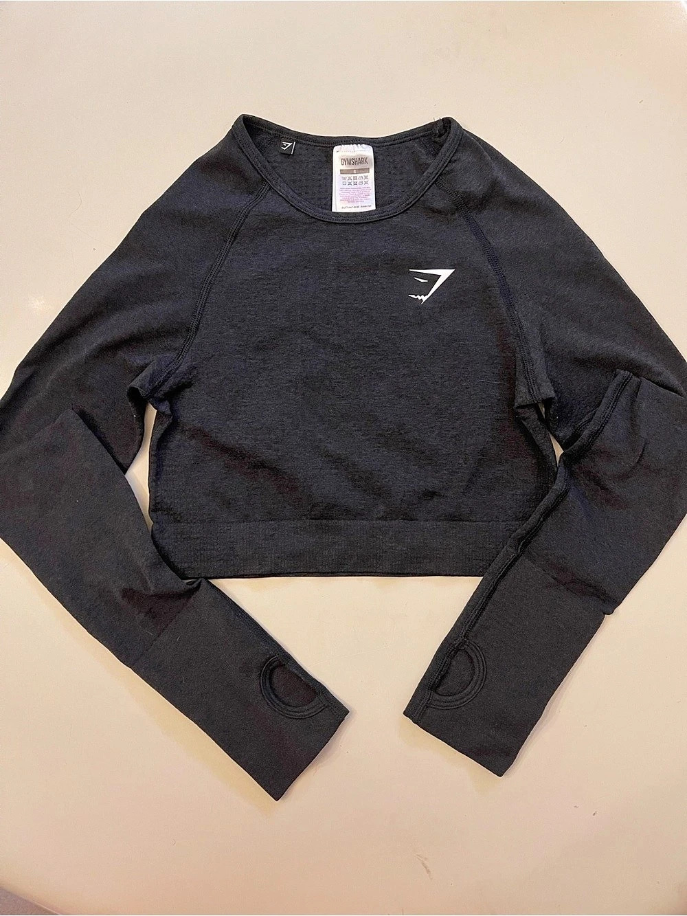 Gymshark Black Long Sleeve Cropped Athletic Top with Thumbholes Size: Small
